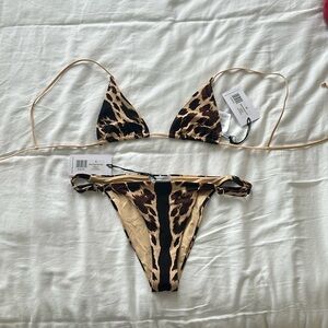 We Wore What Small adjustable bottom and medium micro triangle top. Never worn